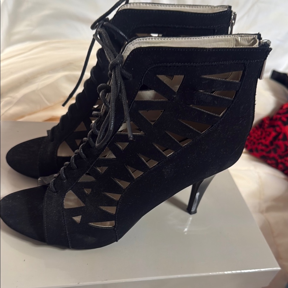 Black Stiletto Heels with Intricate Lacing
